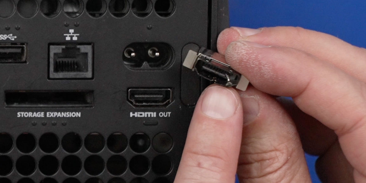 Damaged HDMI port on a console — the kind of damage we repair